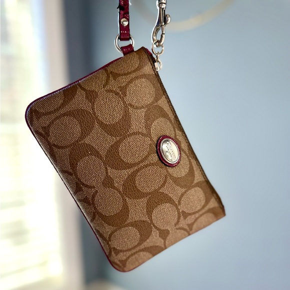 Coach Brown Signature Canvas Wristlet with Plum Trim - Picture 9 of 10